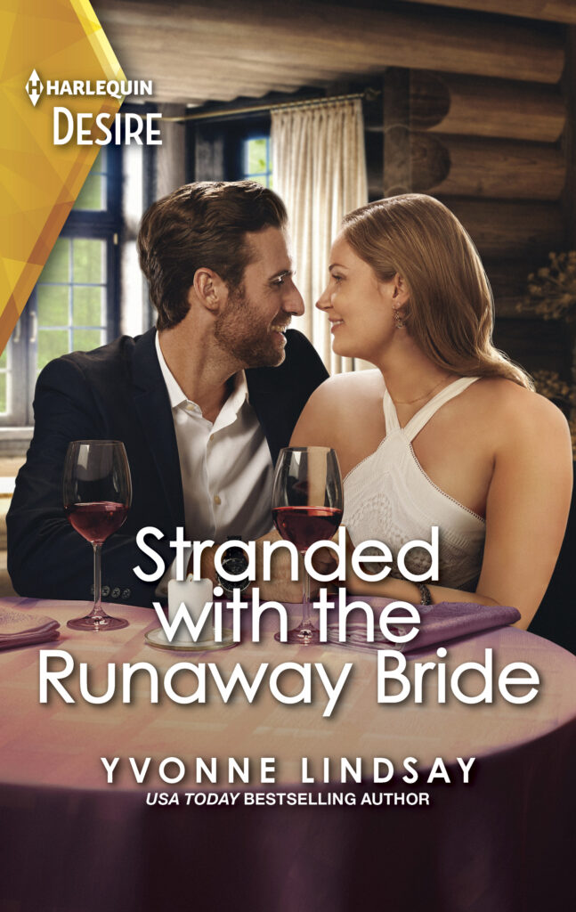 Stranded with the Runaway Bride cover with a well dressed woman and man sit closely at a dining table in a beautiful log cabin