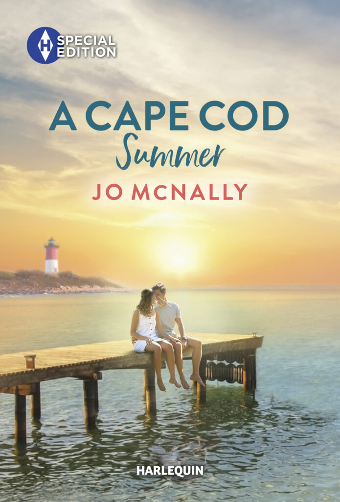Cover for A Cape Cod Summer by Jo McNally. Couple sit on pier at sunset with a lighthouse in the background.