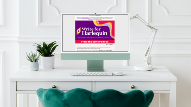 A computer showing the Write for Harlequin newsletter on a white desk in front of a green chair